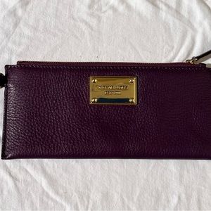 Michael Kors EUC wine colored wristlet wallet